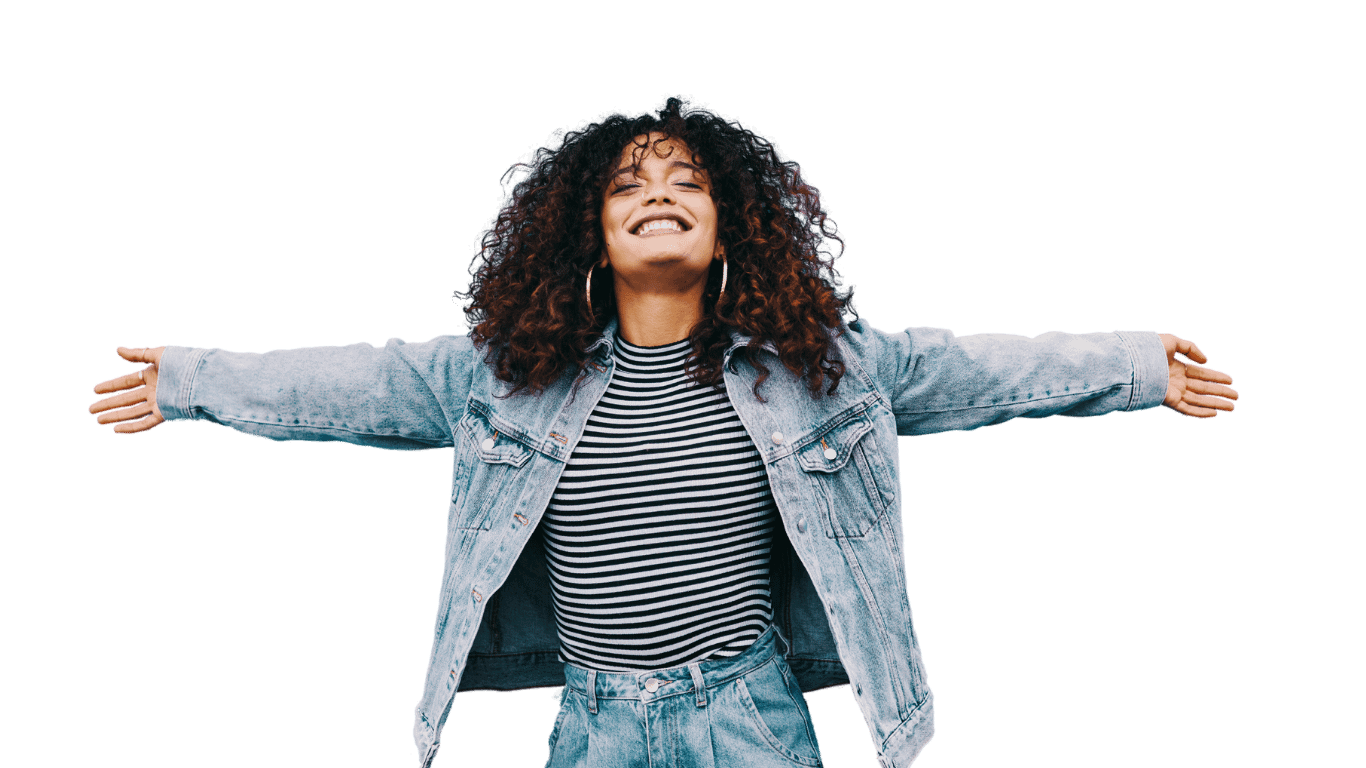 Woman with arms out wide looking free and happy